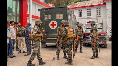 Army personnel at a hospital after a soldier was injured in the exchange of fire with terrorists who were trying to infiltrate into Indian territory, in Poonch district on Tuesday. (PTI) Army personnel at a hospital after a soldier was injured in the exchange of fire with terrorists who were trying to infiltrate into Indian territory, in Poonch district on Tuesday. (PTI)