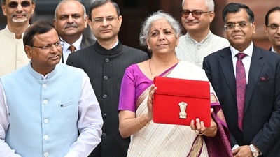 Union Finance Minister Nirmala Sitharaman showcases a red pouch carrying the Budget documents (Photo by Arvind Yadav/ Hindustan Times) (Hindustan Times) Union Finance Minister Nirmala Sitharaman showcases a red pouch carrying the Budget documents (Photo by Arvind Yadav/ Hindustan Times) (Hindustan Times)