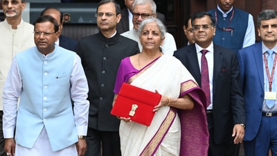 Finance minister Nirmala Sitharaman with the Union Budget 2024 (Photo by Arvind Yadav/ Hindustan Times) Finance minister Nirmala Sitharaman with the Union Budget 2024 (Photo by Arvind Yadav/ Hindustan Times)