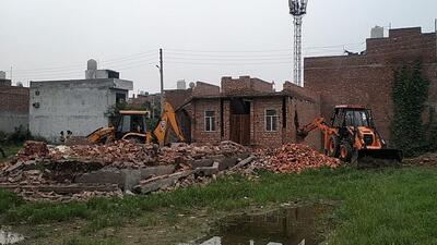 GLADA demolishing unauthorised colonies in Ludhiana villages. (HT)