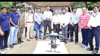 Officials with the drone which will be used to increase green cover on Trikuta Hills (HT)