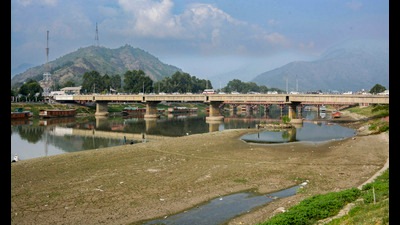 River Jhelum, partially dried due to a long spell of dry weather and heatwave conditions, in Srinagar on Tuesday. (PTI)