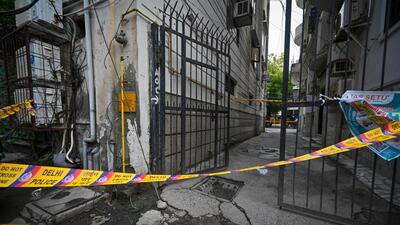 The iron gate where the victim was electrocuted to death during rain at Patel Nagar, central Delhi on Monday. (Sanchit Khanna/HT)