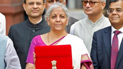 Union finance minister Nirmala Sitharaman leaves her office to present the Union Budget in Parliament on Tuesday. (REUTERS) Union finance minister Nirmala Sitharaman leaves her office to present the Union Budget in Parliament on Tuesday. (REUTERS)