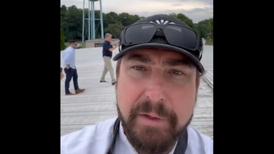 Rep. Eli Crane inspects roof from where Trump shooter opened fire (@RepEliCrane/X) Rep. Eli Crane inspects roof from where Trump shooter opened fire (@RepEliCrane/X)