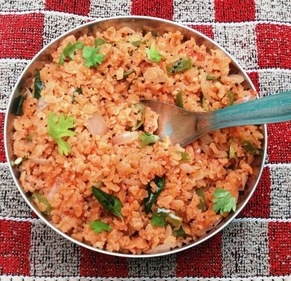 Tomato makes the poha tangy. (Pinterest) Tomato makes the poha tangy. (Pinterest)