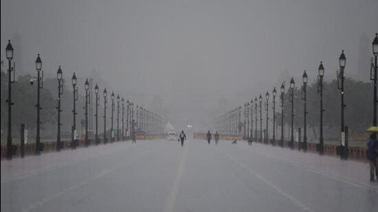 A view of Kartavya Path during heavy rain in New Delhi on Monday. (ANI Photo)