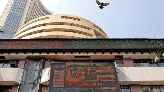 Stock market Live Updates: A bird flies past a screen displaying the Sensex results on the facade of the Bombay Stock Exchange (BSE) building in Mumbai.