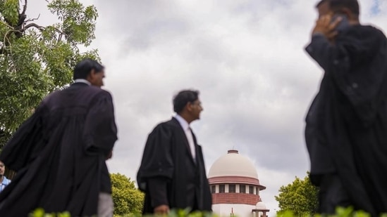 Lawyers at the Supreme Court of India in New Delhi. (PTI Photo)