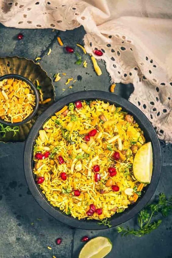 The addition of pomegranates adds freshness to Indori Poha 