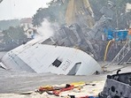 Indian Navy frigate INS Brahmaputra tilted to one side after fire damages. (ANI) Indian Navy frigate INS Brahmaputra tilted to one side after fire damages. (ANI)