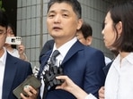 Kim Beom-su, center, the founder of the country's tech giant Kakao Corp., leaves a courtroom after a warrant hearing at the Seoul Southern District Court in Seoul, South Korea, Monday, July 22, 2024. (Yoon Dong-jin/Yonhap via AP) Kim Beom-su, center, the founder of the country's tech giant Kakao Corp., leaves a courtroom after a warrant hearing at the Seoul Southern District Court in Seoul, South Korea, Monday, July 22, 2024. (Yoon Dong-jin/Yonhap via AP)