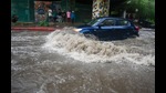 A car wades through a heavily waterlogged stretch in Sector 44, Noida, on Wednesday morning. (SUnil Ghosh/HT Photo) A car wades through a heavily waterlogged stretch in Sector 44, Noida, on Wednesday morning. (SUnil Ghosh/HT Photo)