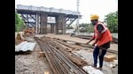 Hyderabad: A worker during the construction of a flyover in Hyderabad, Tuesday, July 23, 2024. (PTI Photo) (PTI) Hyderabad: A worker during the construction of a flyover in Hyderabad, Tuesday, July 23, 2024. (PTI Photo) (PTI)