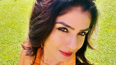 Raveena Tandon clicked a selfie as she stood on the grass. The actor was seen in a mustard shirt and pants. Raveena Tandon clicked a selfie as she stood on the grass. The actor was seen in a mustard shirt and pants.