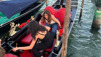 Raveena Tandon's daughter, Rasha Thandani, was seen laughing as she tried to sit on a gondola in another photo. Raveena Tandon's daughter, Rasha Thandani, was seen laughing as she tried to sit on a gondola in another photo.