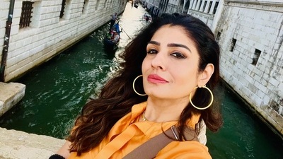 Raveena Tandon shared a picture as she stood on a bridge over a canal. Raveena Tandon shared a picture as she stood on a bridge over a canal.