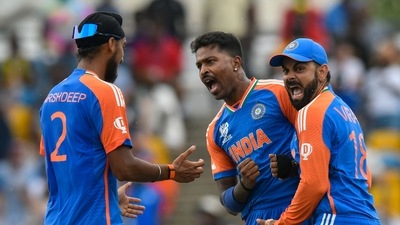 India's Hardik Pandya (C) and teammate Virat Kohli (R) and Arshdeep Singh (L) during T20 World Cup 2024 (AFP) India's Hardik Pandya (C) and teammate Virat Kohli (R) and Arshdeep Singh (L) during T20 World Cup 2024 (AFP)