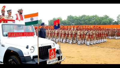 Haryana chief minister Nayab Singh Saini inspecting the parade at the passing out parade organised at the Police Training College in Rohtak’s Sunaria on Wednesday. (Manoj Dhaka/HT) Haryana chief minister Nayab Singh Saini inspecting the parade at the passing out parade organised at the Police Training College in Rohtak’s Sunaria on Wednesday. (Manoj Dhaka/HT)