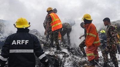 Nepal plane crash LIVE: Rescuers and army personnel stand at the site after a Saurya Airlines' plane crashed during takeoff at Tribhuvan International Airport in Kathmandu on July 24, 2024. (AFP) Nepal plane crash LIVE: Rescuers and army personnel stand at the site after a Saurya Airlines' plane crashed during takeoff at Tribhuvan International Airport in Kathmandu on July 24, 2024. (AFP)