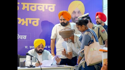 Punjab CM Bhagwant Mann meets people to address their grievances, in Jalandhar on Wednesday. (BhagwantMann - X) Punjab CM Bhagwant Mann meets people to address their grievances, in Jalandhar on Wednesday. (BhagwantMann - X)