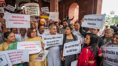 Opposition MPs led by Congress protest inside Parliament premises alleging discrimination in Union Budget 2024 during the Monsoon session, in New Delhi, Wednesday, July 24, 2024. (PTI) Opposition MPs led by Congress protest inside Parliament premises alleging discrimination in Union Budget 2024 during the Monsoon session, in New Delhi, Wednesday, July 24, 2024. (PTI)