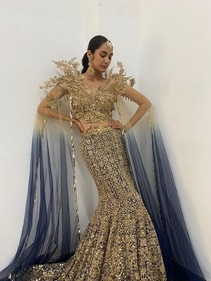A model in Suneet Varma's new collection to be showcased at Hyundai India Couture Week 2024. A model in Suneet Varma's new collection to be showcased at Hyundai India Couture Week 2024.