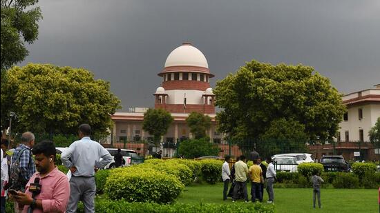 Dark clouds hover over Supreme Court in New Delhi. (ANI Photo)