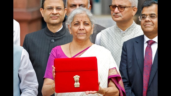 FILE PHOTO: FILE PHOTO: India's Finance Minister Nirmala Sitharaman holds up a folder with the Government of India's logo as she leaves her office to present the union budget in the parliament in New Delhi, India, July 23, 2024. REUTERS/Altaf Hussain/File Photo/File Photo (REUTERS)