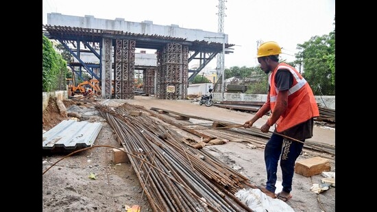 Hyderabad: A worker during the construction of a flyover in Hyderabad, Tuesday, July 23, 2024. (PTI Photo) (PTI)