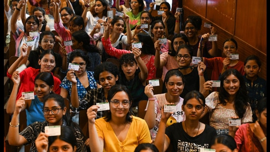 New Delhi, India - Sept. 22, 2023: Students along with their identity cards pose for photographs as they wait to cast their vote during the Delhi University Students Union (DUSU) Election at Miranda House in North Campus in New Delhi, India, on Friday, September 22, 2023. (Photo by Raj K Raj/ Hindustan Times) (Hindustan Times)