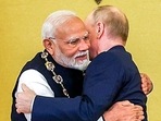 Prime Minister Narendra Modi embraces Russian President Vladimir Putin after receiving the Order of St Andrew the Apostle the First-Called, Russia's highest civilian honour, at St Catherine's Hall, in Moscow. (ANI Photo) Prime Minister Narendra Modi embraces Russian President Vladimir Putin after receiving the Order of St Andrew the Apostle the First-Called, Russia's highest civilian honour, at St Catherine's Hall, in Moscow. (ANI Photo)
