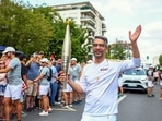 : Olympic gold medallist Abhinav Bindra carries the Olympic flame in the Paris 2024 Torch Relay, on Wednesday.(Abhinav_Bindra - X) : Olympic gold medallist Abhinav Bindra carries the Olympic flame in the Paris 2024 Torch Relay, on Wednesday.(Abhinav_Bindra - X)