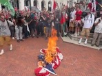 Crowd burns American flags in Washington to protest Netanyahu's visit (@TimcastNews screenshot/X)