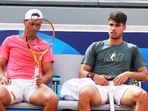 Rafael Nadal and Carlos Alcaraz during a practice session. Rafael Nadal and Carlos Alcaraz during a practice session.