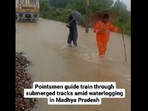 Snapshot of the pointsmen guiding the train. Snapshot of the pointsmen guiding the train.