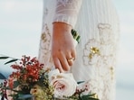The woman is holding a ghost marriage to honour her late boyfriend. The woman is holding a ghost marriage to honour her late boyfriend.