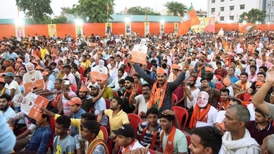 Patna, Bihar, India -May .28, 2024: BJP supporters gather during Uttar Pradesh Chief Minister Yogi Adityanath addressing a public election rally (Photo by Santosh Kumar/ Hindustan Times)