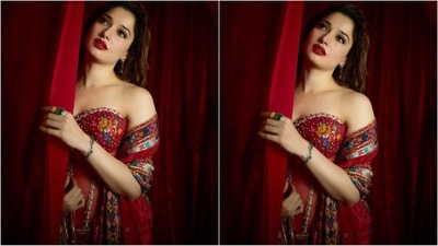 She accessorised her look with a pair of dangling statement earrings, a green emerald ring on her finger and a sleek bracelet on her wrist that perfectly complemented her look. (Instagram/@tamannaahspeaks) She accessorised her look with a pair of dangling statement earrings, a green emerald ring on her finger and a sleek bracelet on her wrist that perfectly complemented her look. (Instagram/@tamannaahspeaks)