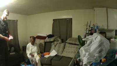 In this image taken from body camera video released by Illinois State Police, Sonya Massey, second from left, talks with former Sangamon County Sheriff’s Deputy Sean Grayson inside her home in Springfield, Ill., July 6, 2024. (Illinois State Police via AP) (AP) In this image taken from body camera video released by Illinois State Police, Sonya Massey, second from left, talks with former Sangamon County Sheriff’s Deputy Sean Grayson inside her home in Springfield, Ill., July 6, 2024. (Illinois State Police via AP) (AP)