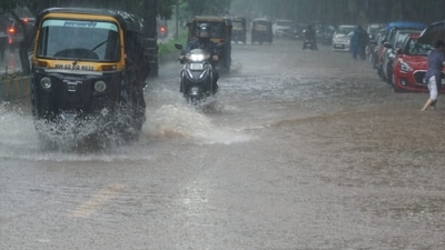 A waterlogged street in Thane. HT Photo (Prafula Gangurde) A waterlogged street in Thane. HT Photo (Prafula Gangurde)