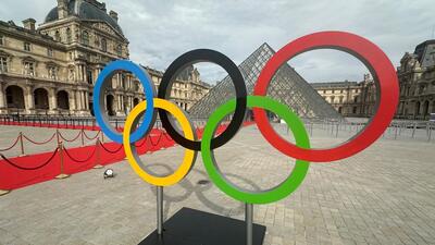 The Olympic rings are seen at the entrance of the Louvre Museum. (REUTERS) The Olympic rings are seen at the entrance of the Louvre Museum. (REUTERS)
