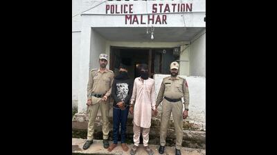 The two terror operatives in police custody at Malhar in Kathua district on Thursday. The duo provided food and hotspot connection to the terrorists responsible for the July 8 ambush on an army convoy in Kathua’s Badnota village. They also helped the terrorists escape after the attack. (HT Photo)