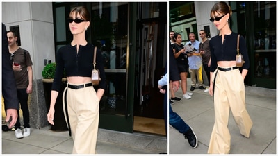 or another look from the same day, the Where the Crawdads Sing star opted for a business casual ensemble. A black cardigan-like crop top with three-quarter sleeves was styled with beige dress-pants, black pumps, black shades, and a statement black belt that brought the look together. or another look from the same day, the Where the Crawdads Sing star opted for a business casual ensemble. A black cardigan-like crop top with three-quarter sleeves was styled with beige dress-pants, black pumps, black shades, and a statement black belt that brought the look together.