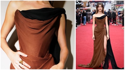 The European premiere saw her in a mocha-coloured dreamy corseted Vivienne Westwood gown with a thigh-high slit and a black sash draped from her left shoulder. The look was brought together with black pumps and minimal accessorising. The European premiere saw her in a mocha-coloured dreamy corseted Vivienne Westwood gown with a thigh-high slit and a black sash draped from her left shoulder. The look was brought together with black pumps and minimal accessorising.