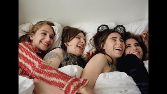 In Girls, all four friends are spoiled and crazy, but they grow together.