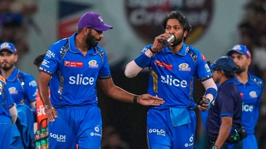 Mumbai Indian captain Hardik Pandya with teammate Jasprit Bumrah during an Indian Premier League(PTI)