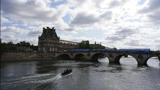 The opening ceremony for the Paris Olympics will be held at Seine River on Friday. (AP)