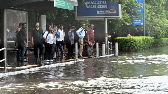 The waterlogging problem has plagued the Capital for decades as the drainage system is unable to keep pace with unplanned construction, and much of its stormwater management features are either blocked or have disappeared, leading to a few hours of heavy rain triggering widespread chaos. (Arvind Yadav/HT Photo) The waterlogging problem has plagued the Capital for decades as the drainage system is unable to keep pace with unplanned construction, and much of its stormwater management features are either blocked or have disappeared, leading to a few hours of heavy rain triggering widespread chaos. (Arvind Yadav/HT Photo)