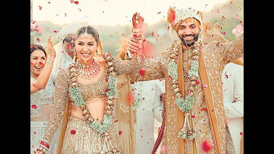 Actor Malvika Raaj’s wedding featured snapshots of the couple framed by rose petals. (EPIC STORIES)